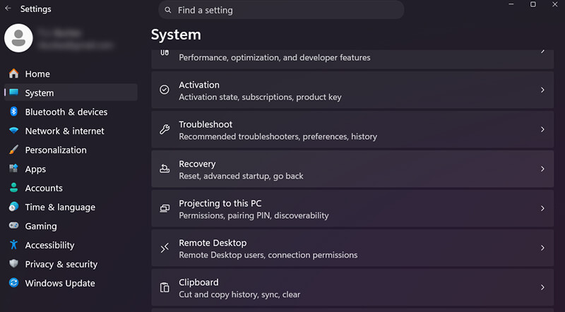 A screenshot showing Recovery options in the System Settings menu.
